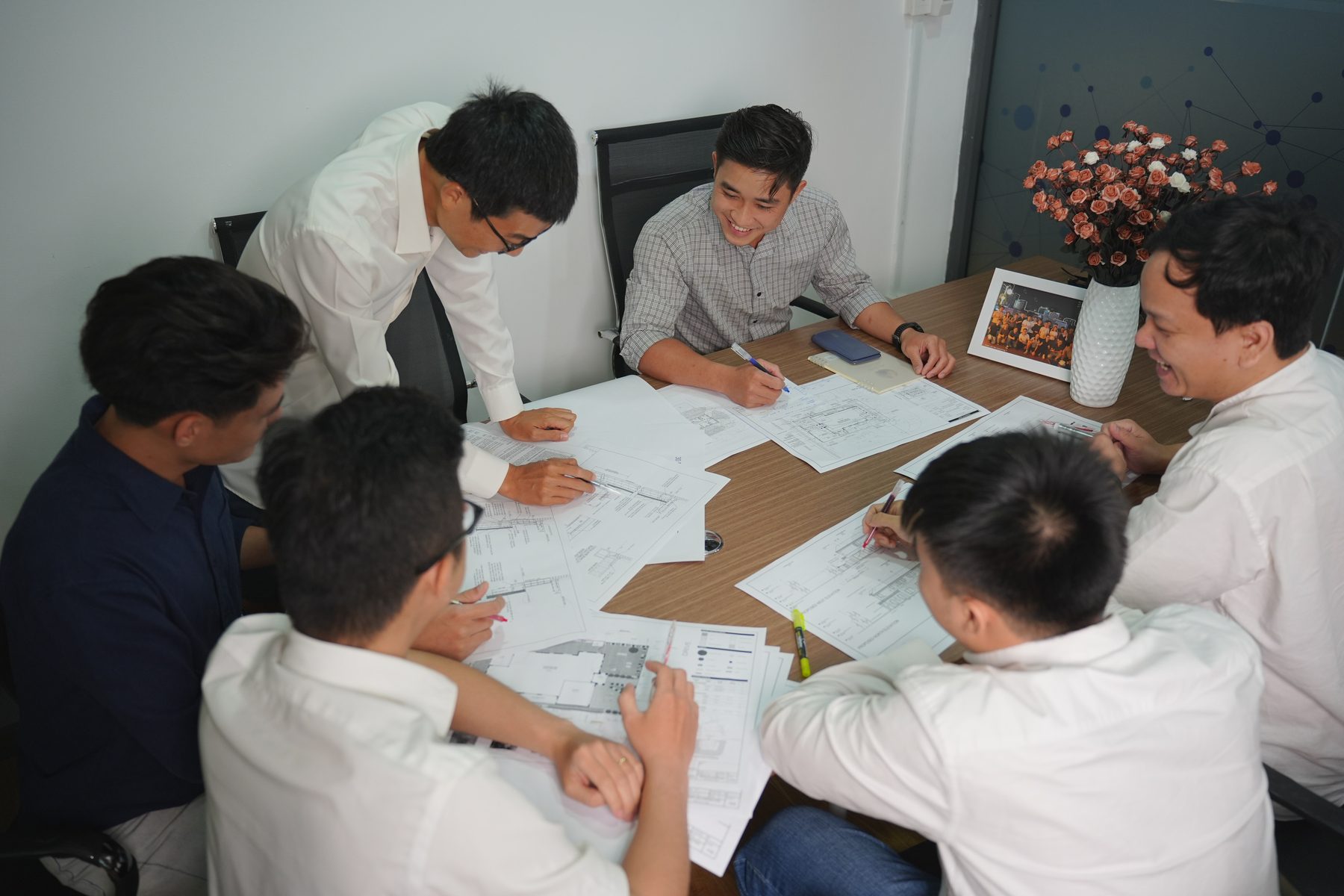 CommonWorks engineers reviewing drawings together